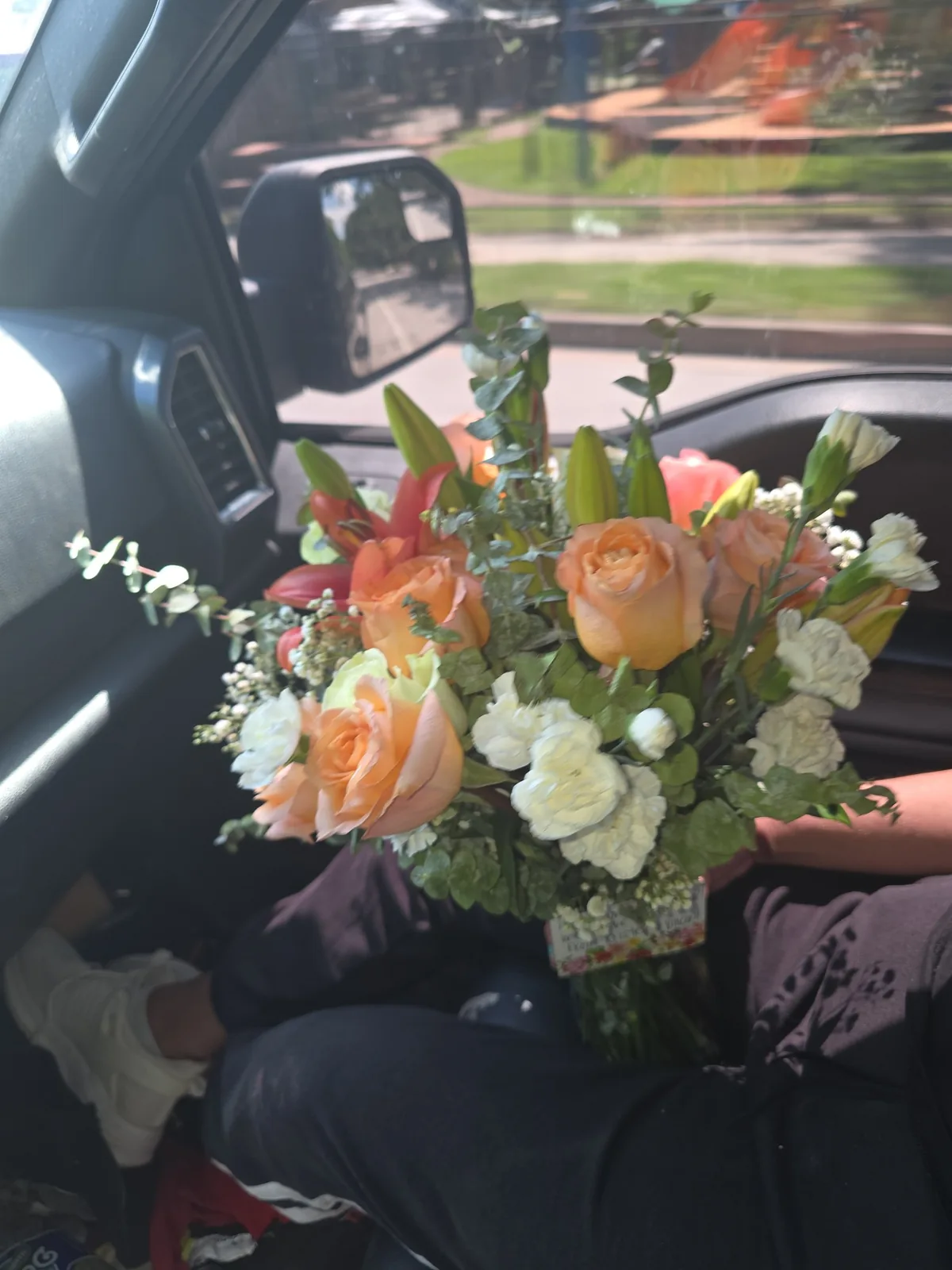 Guns N Roses — soft peach and blush rose arrangement in clear glass vase | same-day delivery Houston Heights