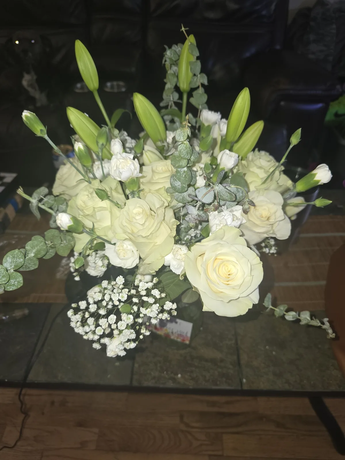 White rose, lily, and eucalyptus funeral arrangement — Houston sympathy and condolence flower delivery by Lola in Bloom